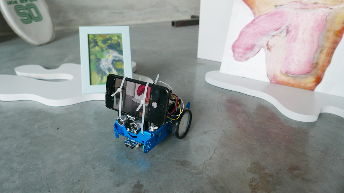 The robot navigating through the exhibition space